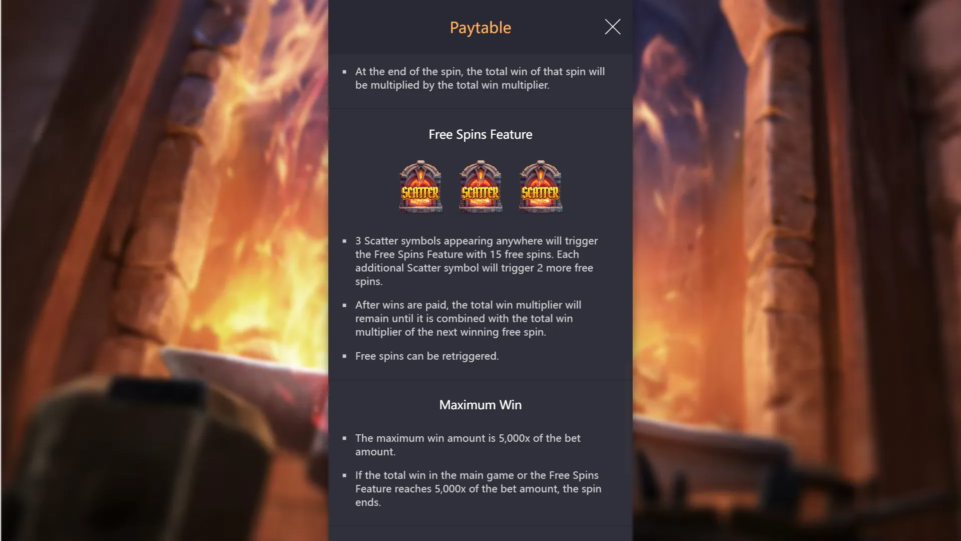 Forge of Wealth FREE SPINS FEATURE showing three Scatter symbols that trigger 15 free spins, with Maximum Win 5000x cap rules